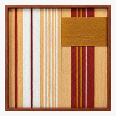 Frontal studio shot of the Carmine Pulse square hand-woven textile wall art featuring carmine red, white, and mustard yellow vertical stripes with a solid mustard patch in a wooden frame.
