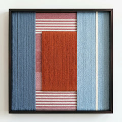 An angled perspective of the Cold Fire wool tapestry, showcasing the dimensional depth and layered winding technique of the fibers.