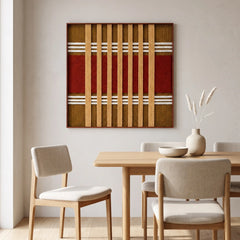 The Gilded Coronation hand-woven wool tapestry hangs elegantly above a wooden dining table in a bright, modern dining room setting.