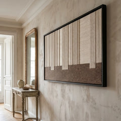 Striking rectangular hand-woven wool tapestry positioned perfectly in a bright hallway, hanging above a narrow console table.