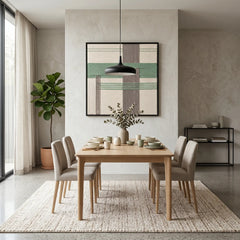 Soft sage green geometric wool tapestry styled as a calming focal point in a contemporary dining room above a light wood dining table.