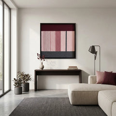 Wide interior shot of a contemporary living room styled with the Rosy Pulse hand-woven wool wall art as a focal point.