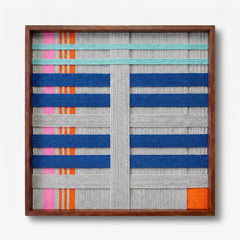 Frontal studio shot of the Silent Dopamine hand-woven wool wall art featuring colorful blue and orange geometric patterns in a wooden frame against a clean white background.