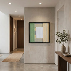 Sun-Baked textured fiber art creating a warm focal point in a minimalist home foyer above a simple wooden console.