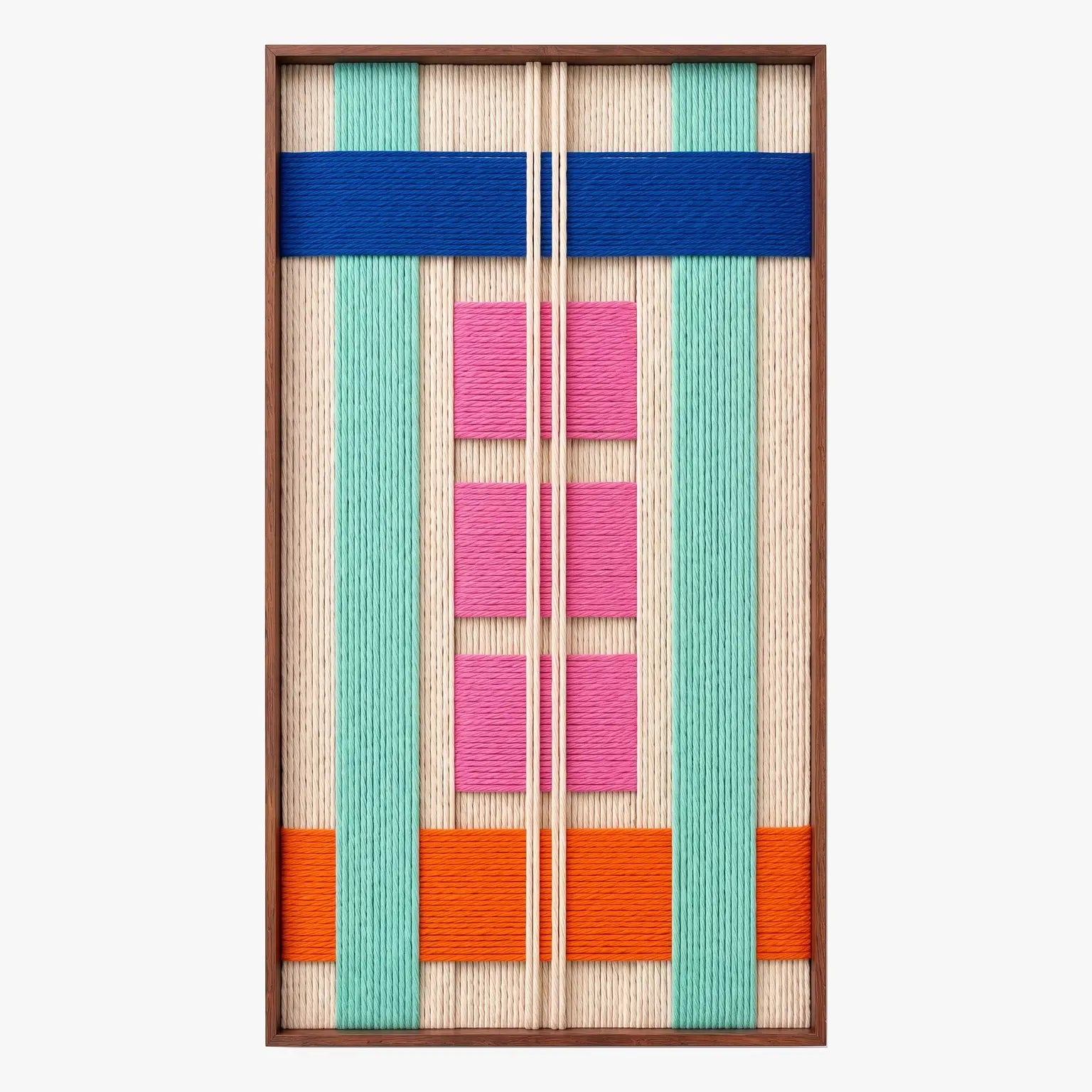 Frontal studio shot of the Vegas Strip rectangular hand-woven wool tapestry with bold geometric patterns in a wooden frame.