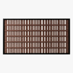 Frontal studio shot of the Cocoa Cadence hand-woven wool wall art featuring a rhythmic brown and cream vertical grid pattern in a black frame.