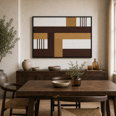 Earth-toned geometric hand-woven wool tapestry beautifully staged in a warm dining room, hanging over a rustic wooden sideboard.