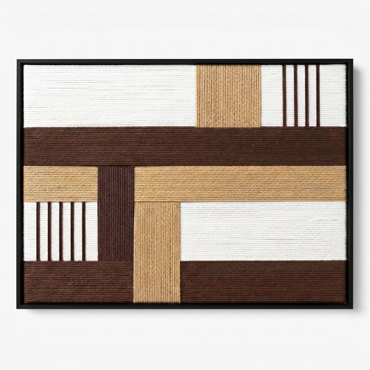 Frontal studio shot of the Cocoa Loom hand-woven wool wall art featuring brown and beige geometric patterns in a black frame.