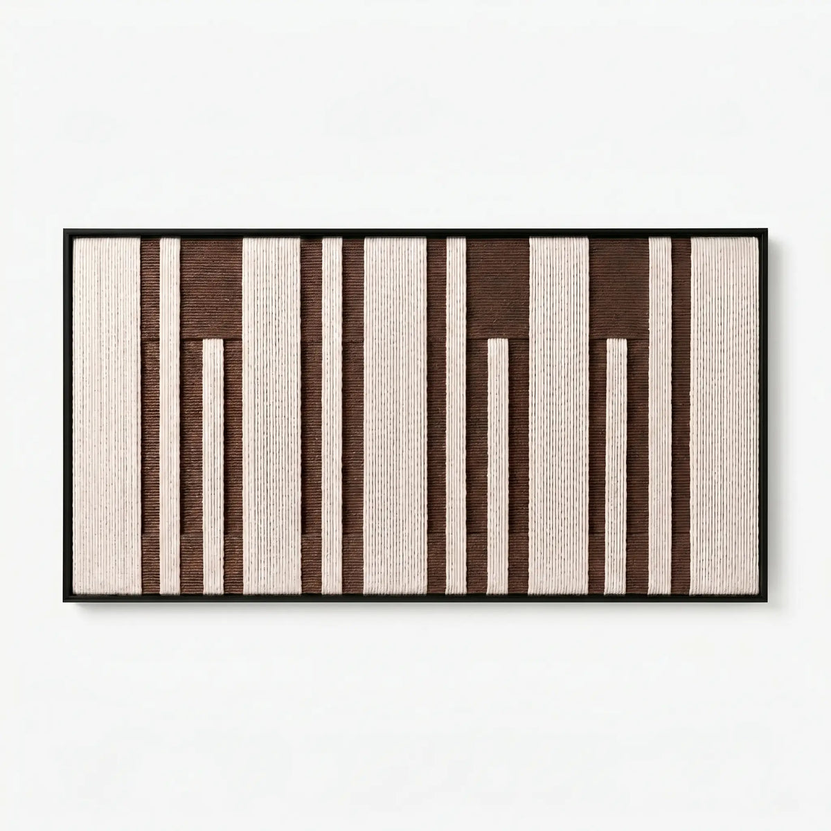 Frontal studio shot of the Cocoa Pillars hand-woven wool wall art featuring brown and cream vertical patterns.