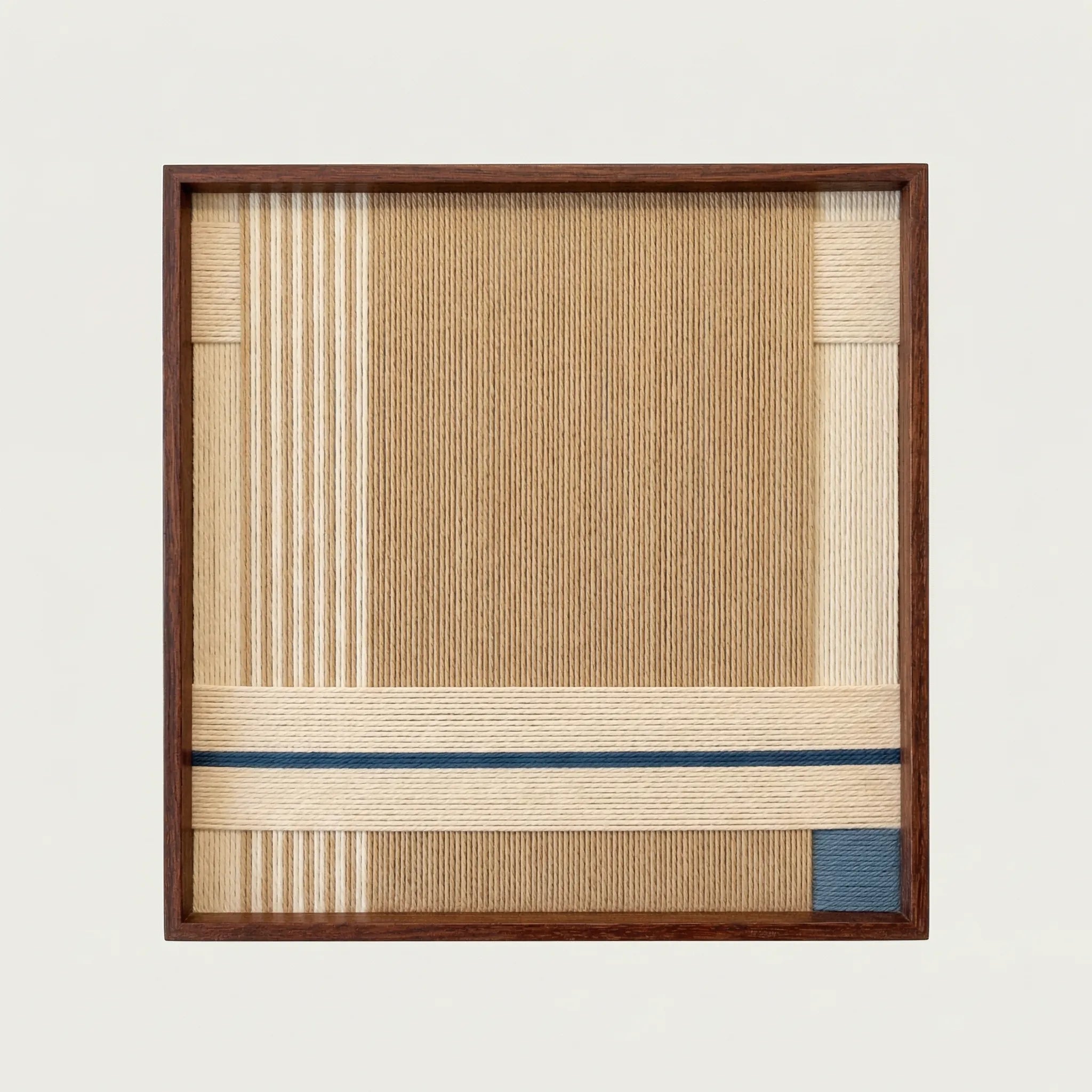 Close-up front view of A Collected Morning hand-woven wool wall art showing the intricate vertical weaving and dark wood frame details.