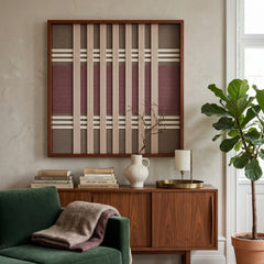 Earth-toned Dusty Tones framed wall art styled elegantly above a wooden sideboard next to a large indoor potted plant in a serene living room.