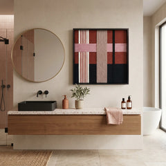 Sophisticated hand-woven wool wall art styled in a luxury bathroom above a floating oak vanity and circular mirror.