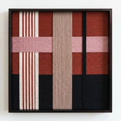 Frontal studio shot of the Flower-Bed Secrets hand-woven wool wall art in a black frame against a clean white background.