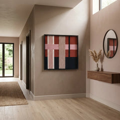 Square pink and terracotta textured fiber art creating a warm focal point in a minimalist hallway foyer with natural light.