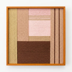 Frontal studio shot of Folded Dialogue hand-woven wool wall art featuring dusty pink and espresso geometric blocks in an oak frame.