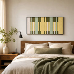 A beautiful framed Garden Interval wool tapestry hanging elegantly above a neatly styled bed with matching green bedding in a cozy room.