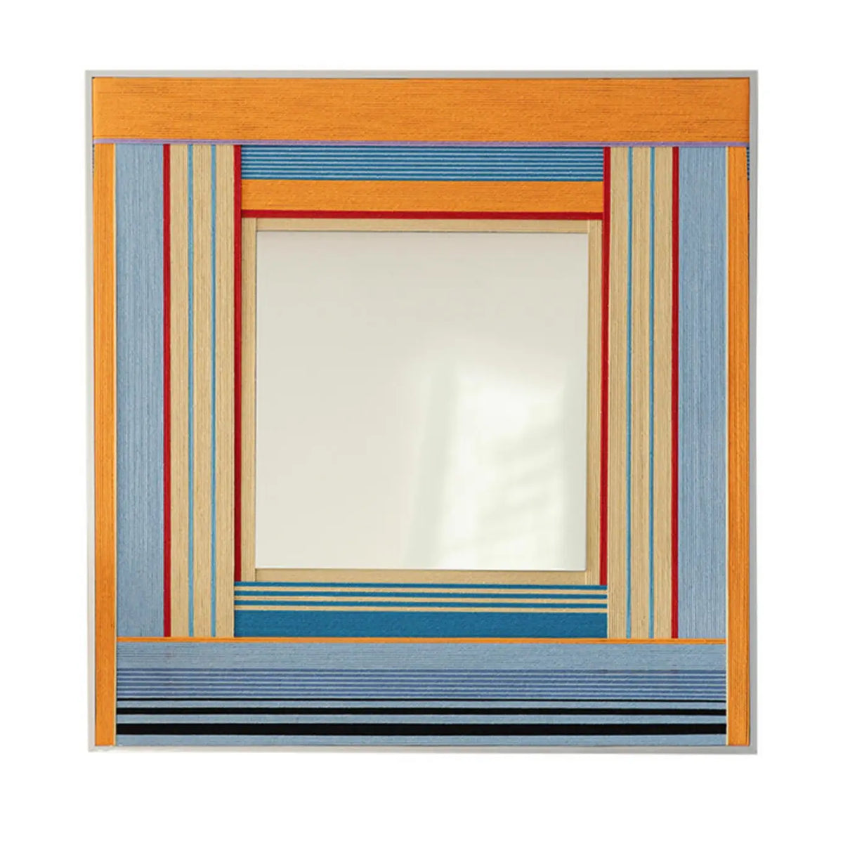 Frontal studio shot of the Miami Sunsets textile mirror art featuring a square central mirror bordered by hand-woven orange, blue, and pastel striped yarn against a clean white background.