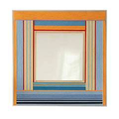 Frontal studio shot of the Miami Sunsets textile mirror art featuring a square central mirror bordered by hand-woven orange, blue, and pastel striped yarn against a clean white background.