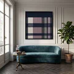 Large square Midnight Lavender hand-woven wall art hanging elegantly above a plush teal velvet curved sofa in a classic, brightly lit living room.
