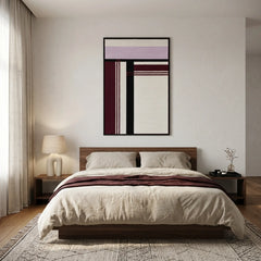 Large hand-woven wool wall art with burgundy and lavender geometric patterns styled as a headboard focal point in a modern bedroom.