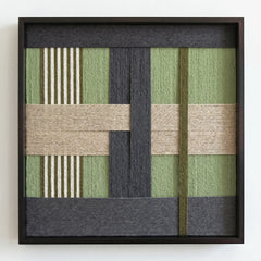 Frontal studio shot of the Misty Forest hand-woven wool wall art in a square black frame against a clean white background.