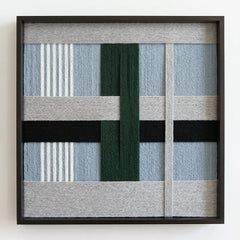 Frontal studio shot of the Moonlight Glade hand-woven wool wall art in a square black frame against a clean white background.