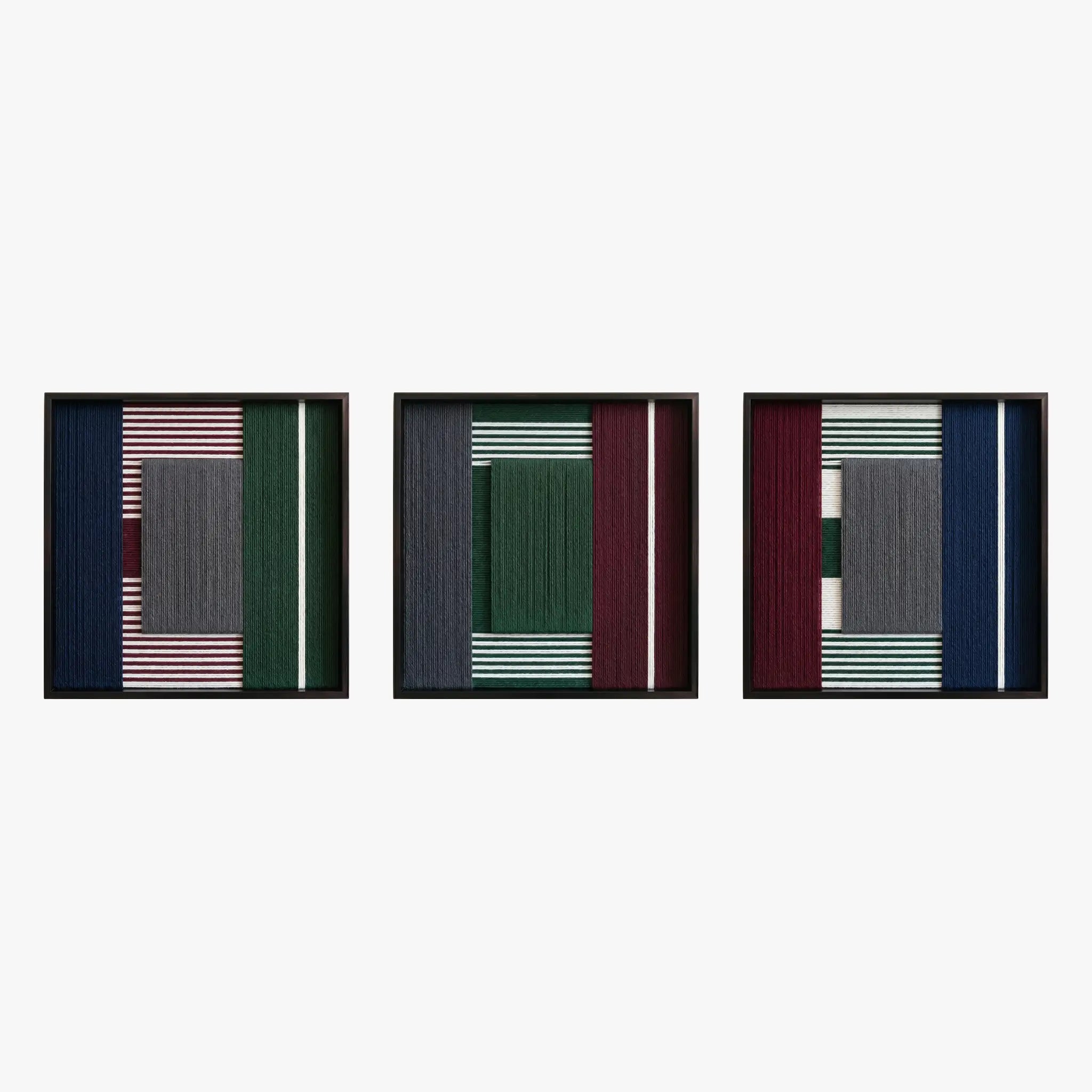 Frontal studio shot of the Overture of Dusk & Dawn triptych set, showcasing three matching square hand-woven textile art pieces in black frames.