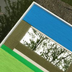 Inspiration graphic for Riverside featuring a riverside landscape and the quote “Where colors flow like water, calm follows” to illustrate the design concept
