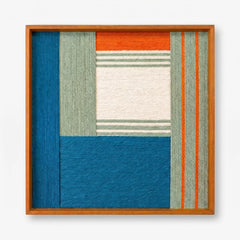 Frontal studio shot of the Silent Theatre hand-woven wool wall art in a square oak-finish frame against a clean white background.