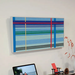 Close-up of Summer Story yarn wall art revealing the looped wool texture and crisp transitions between stripe colors
