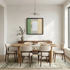 Modern framed wool tapestry styled in a contemporary dining room with light wood furniture and minimalist architectural details.
