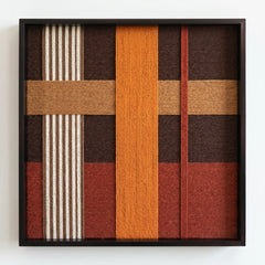 Professional studio shot of the Sunlit Symphony hand-woven fiber art against a clean white background, showcasing earth-toned geometric patterns.