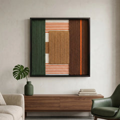 Modern framed wool tapestry displayed in a sunlit living room above a walnut sideboard with a dark green armchair.