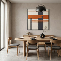 Vibrant geometric wool tapestry styled as a bold focal point in a contemporary dining room above a light wood sideboard and dining table.