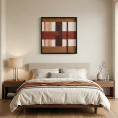 Sophisticated hand-woven wool wall art styled in a serene bedroom above a low wooden bed frame with neutral linens.