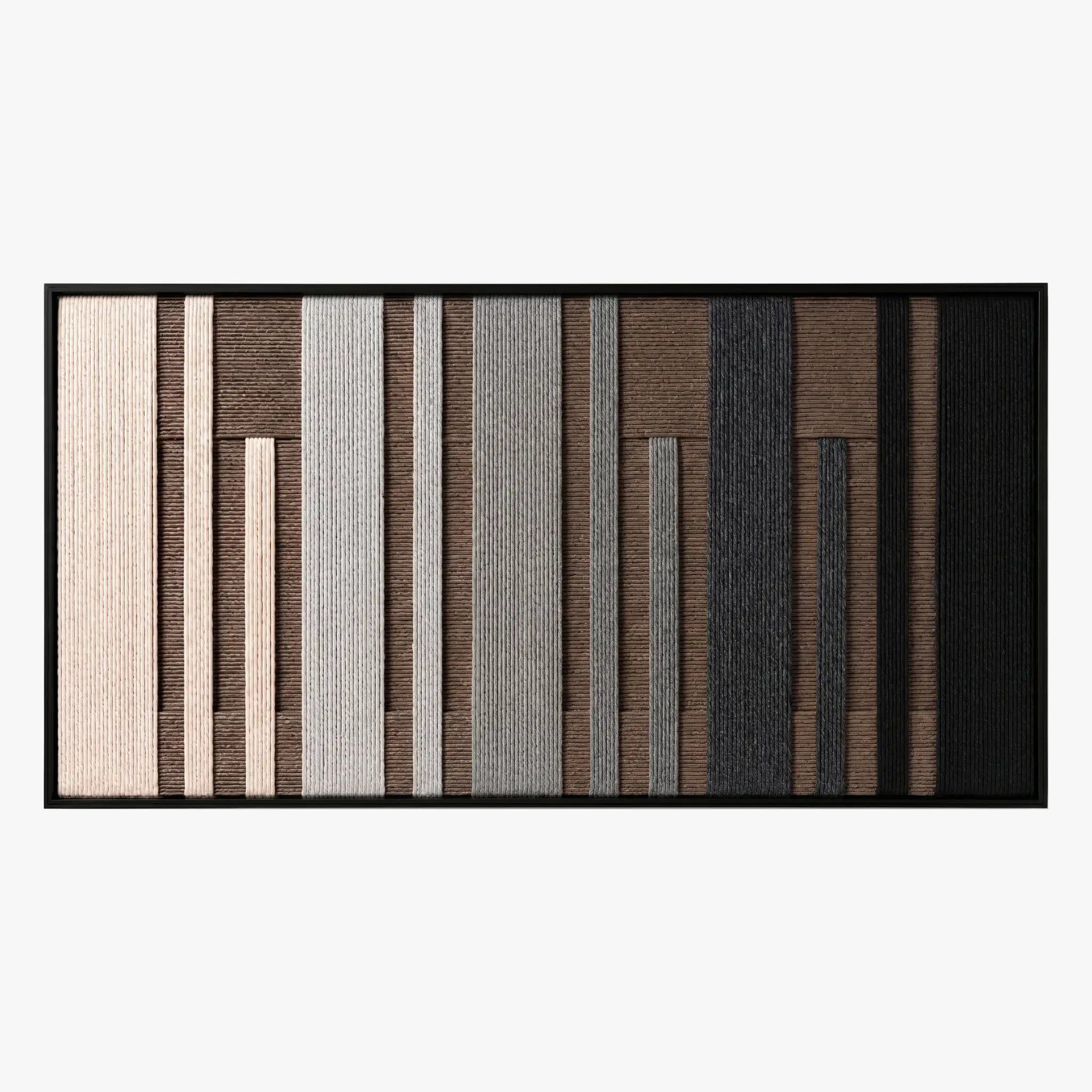 Frontal studio shot of the Umber Columns hand-woven wool wall art featuring vertical grey, brown, black, and cream stripes in a black frame.