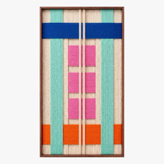 Frontal studio shot of the Vegas Strip rectangular hand-woven wool tapestry with bold geometric patterns in a wooden frame.