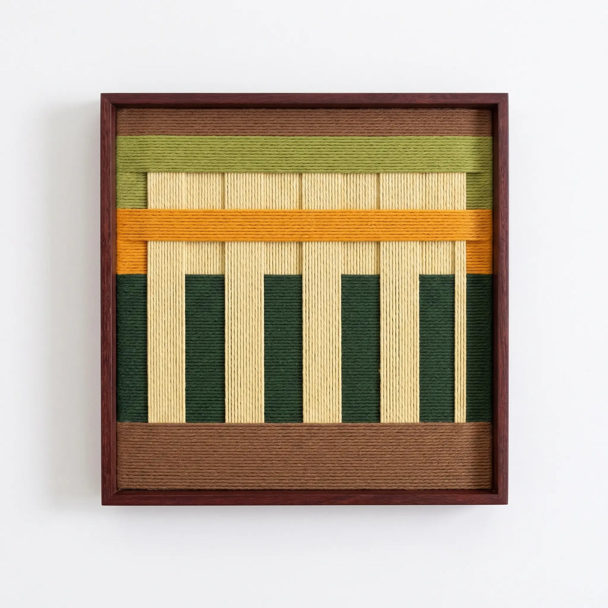 High-resolution front view of The Verdant Altar hand-woven wool wall art showcasing the intricate vertical columns and horizontal textured fiber bands.