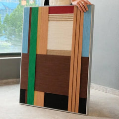 Wild hand-woven yarn art showing subtle shade shifts from tan to olive and the tactile looped yarn surface
